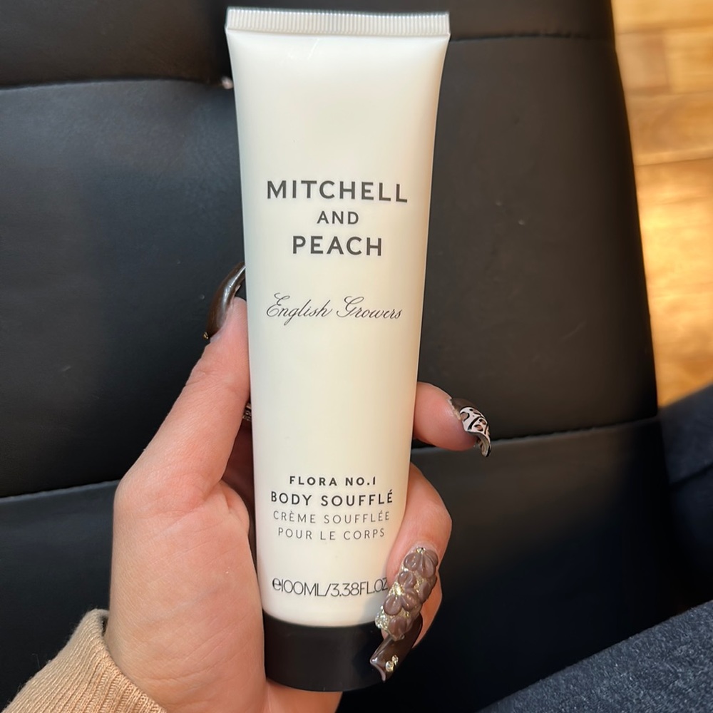 Brand new never used or opened Mitchell and peach body soufflé!